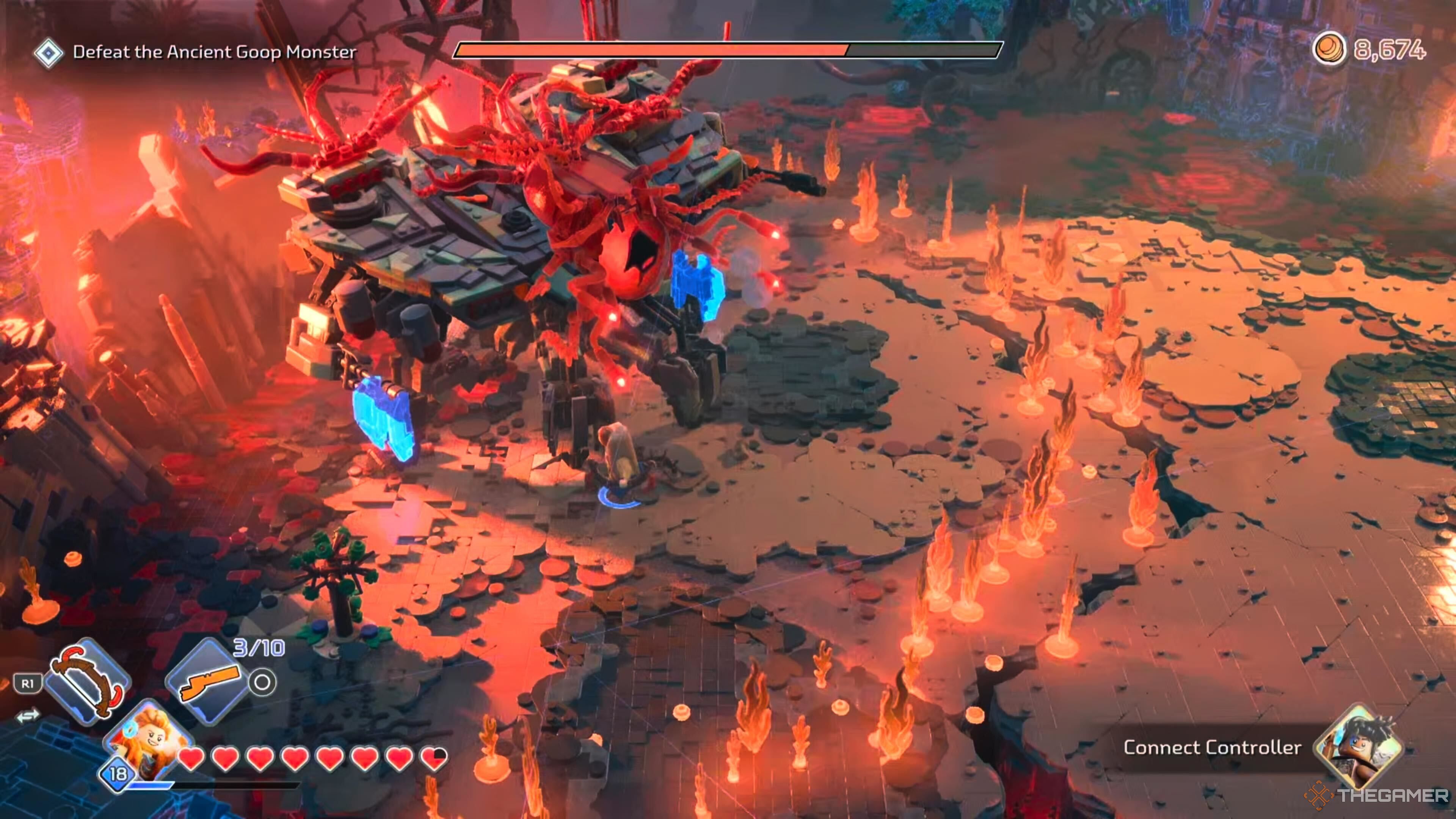 Attacking the Goop Monster's legs in Lego Horizon Adventures.