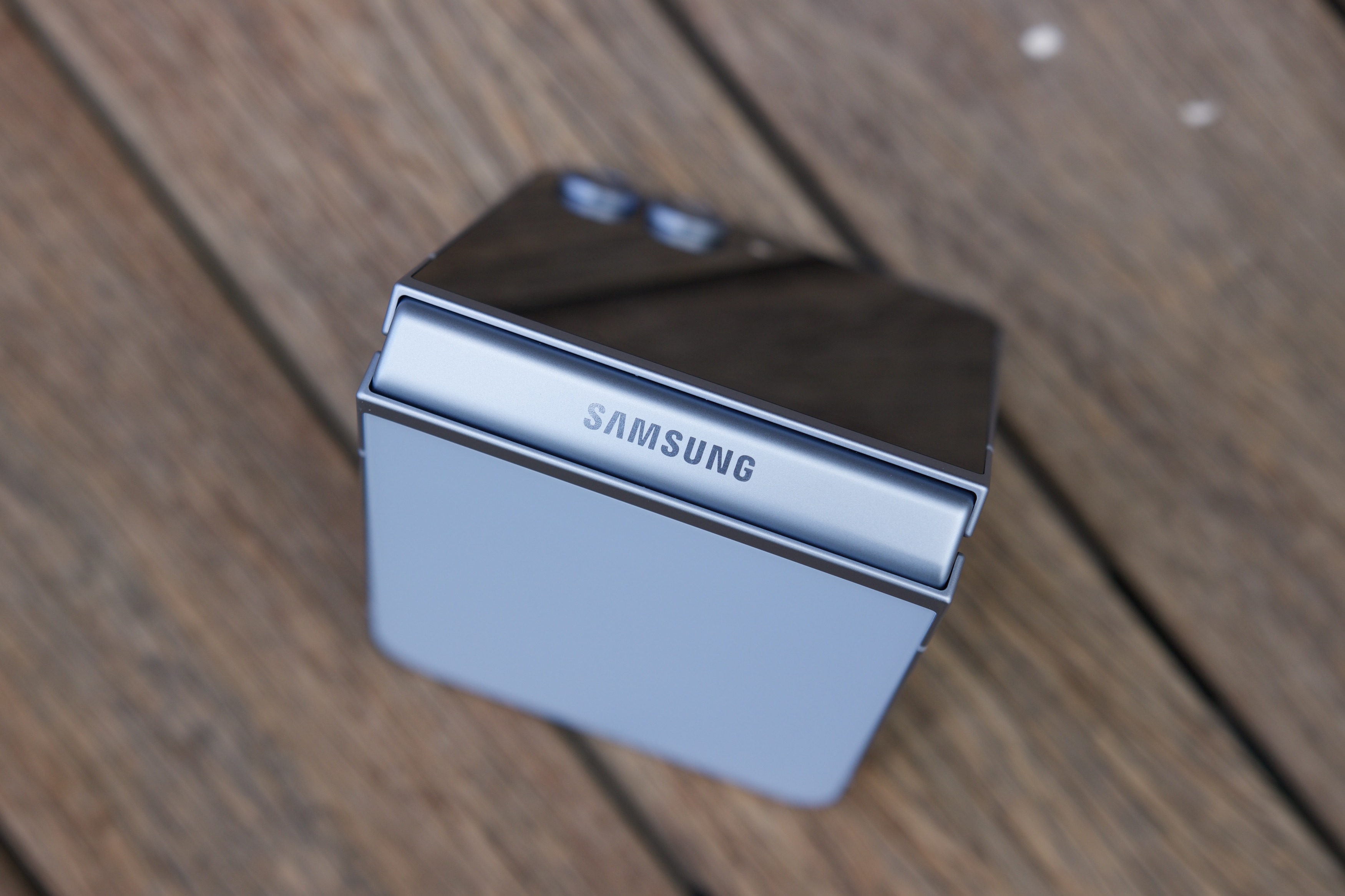 Close-up of the Samsung Galaxy Z Flip 6 logo.