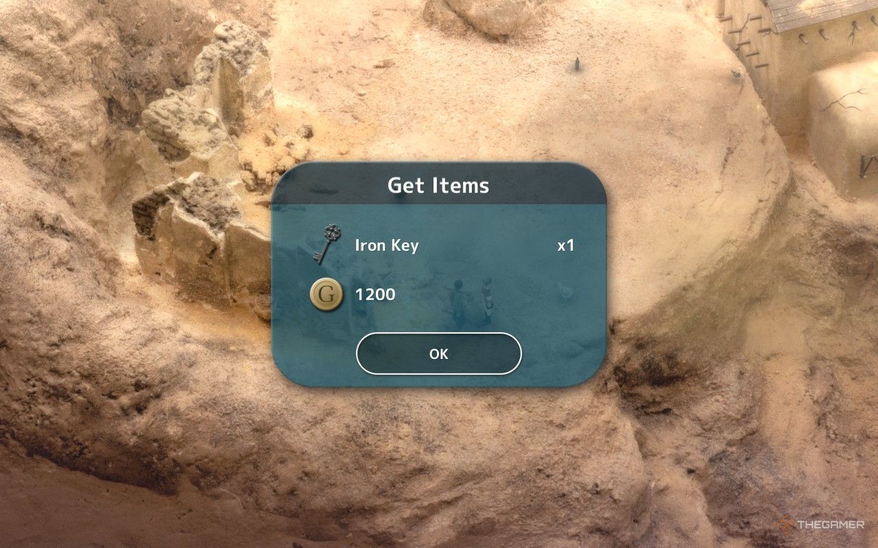 An iron key and 1200 gold being given as a reward for the beloved cat quest in fantasian.