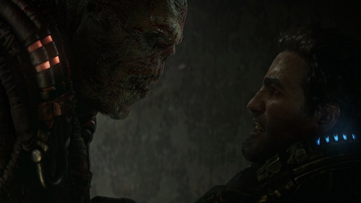 A Locust warrior confronts Marcus Fenix.