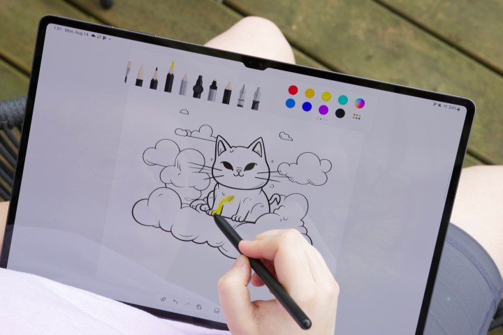 A person coloring with the S Pen on the Samsung Galaxy Tab S9 Ultra.