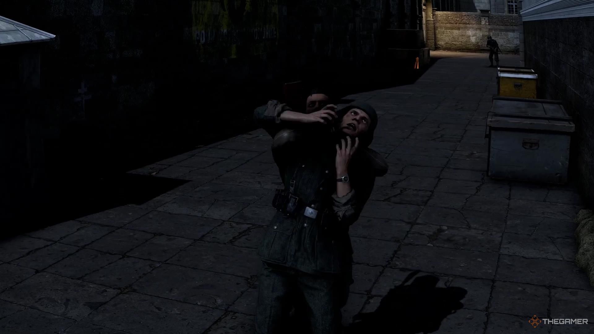 A Nazi appears terrified as they're choked from behind in Sniper Elite Resistance.