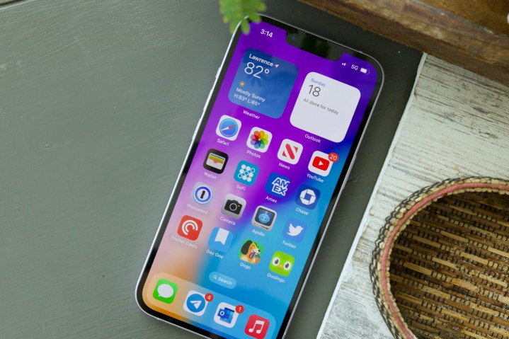 An iPhone 14 displaying its home screen.
