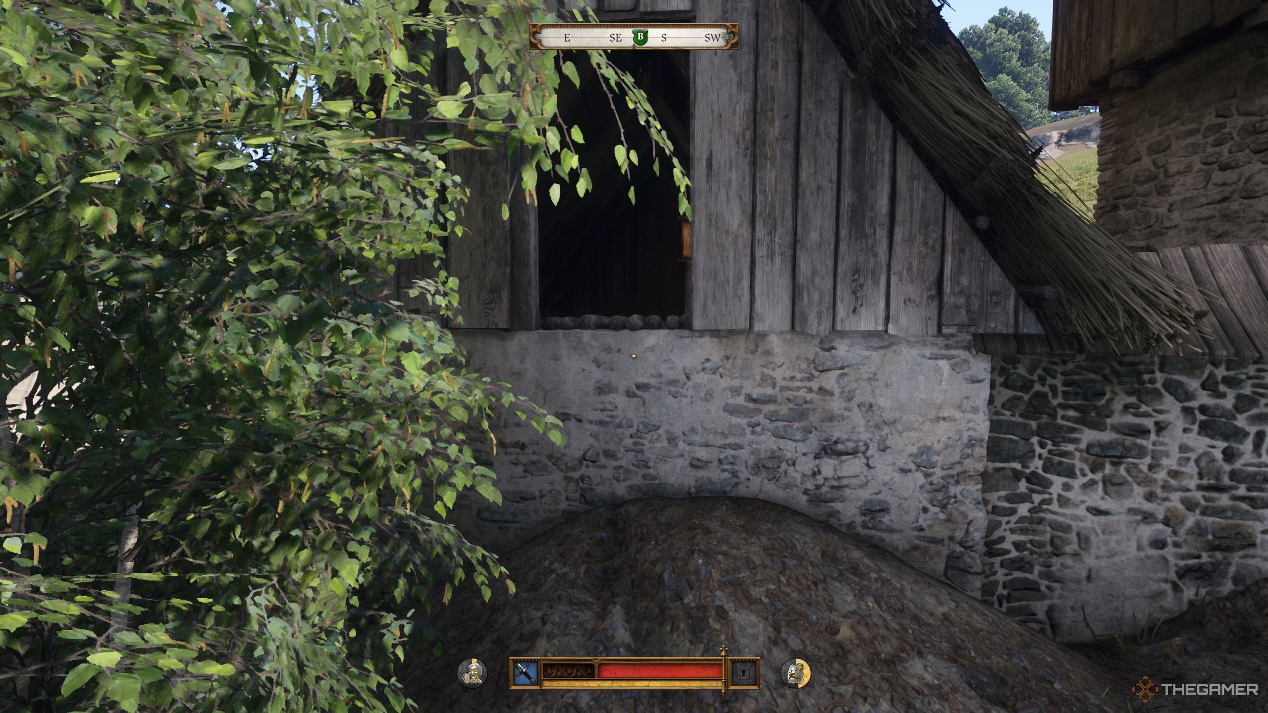 Henry standing by an open window in Kingdom Come: Deliverance 2.