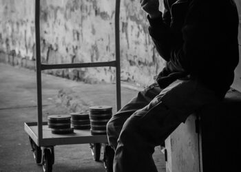 Amazon Shopping card boxes and credit cards on laptop keyboard