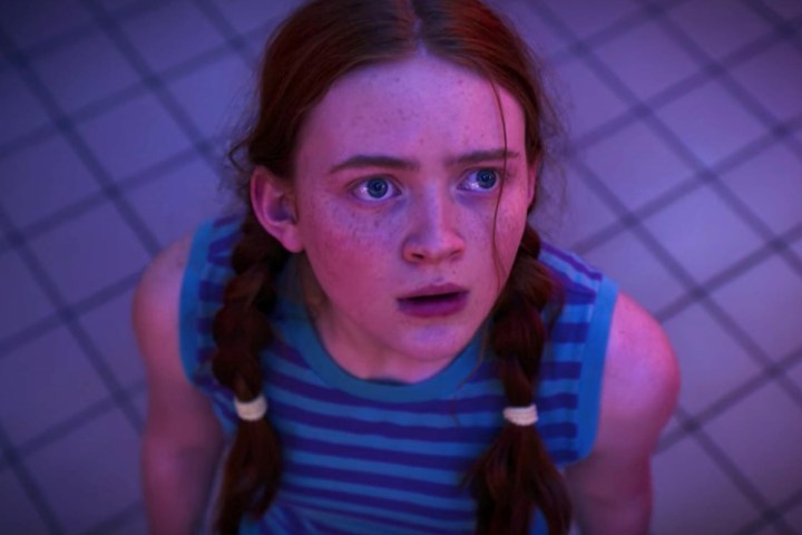 Sadie Sink looks up in the mall.