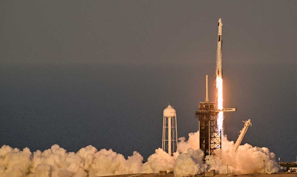 A SpaceX Falcon 9 rocket with four astronauts launches from Cape Canaveral, Florida, on March 14, 2025.