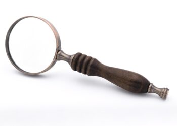 Steam logo on top of a background full of Steam library games