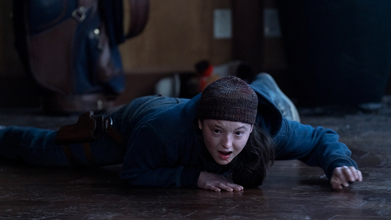 Ellie lying on the ground screaming in The Last of Us.