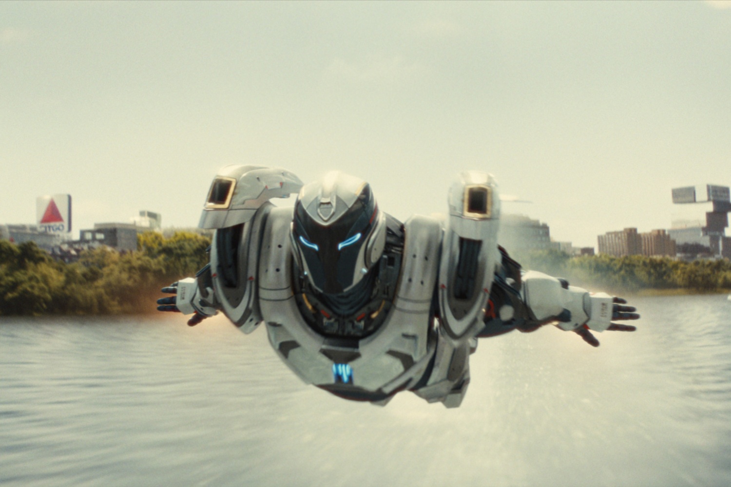 Ironheart flies over the water.