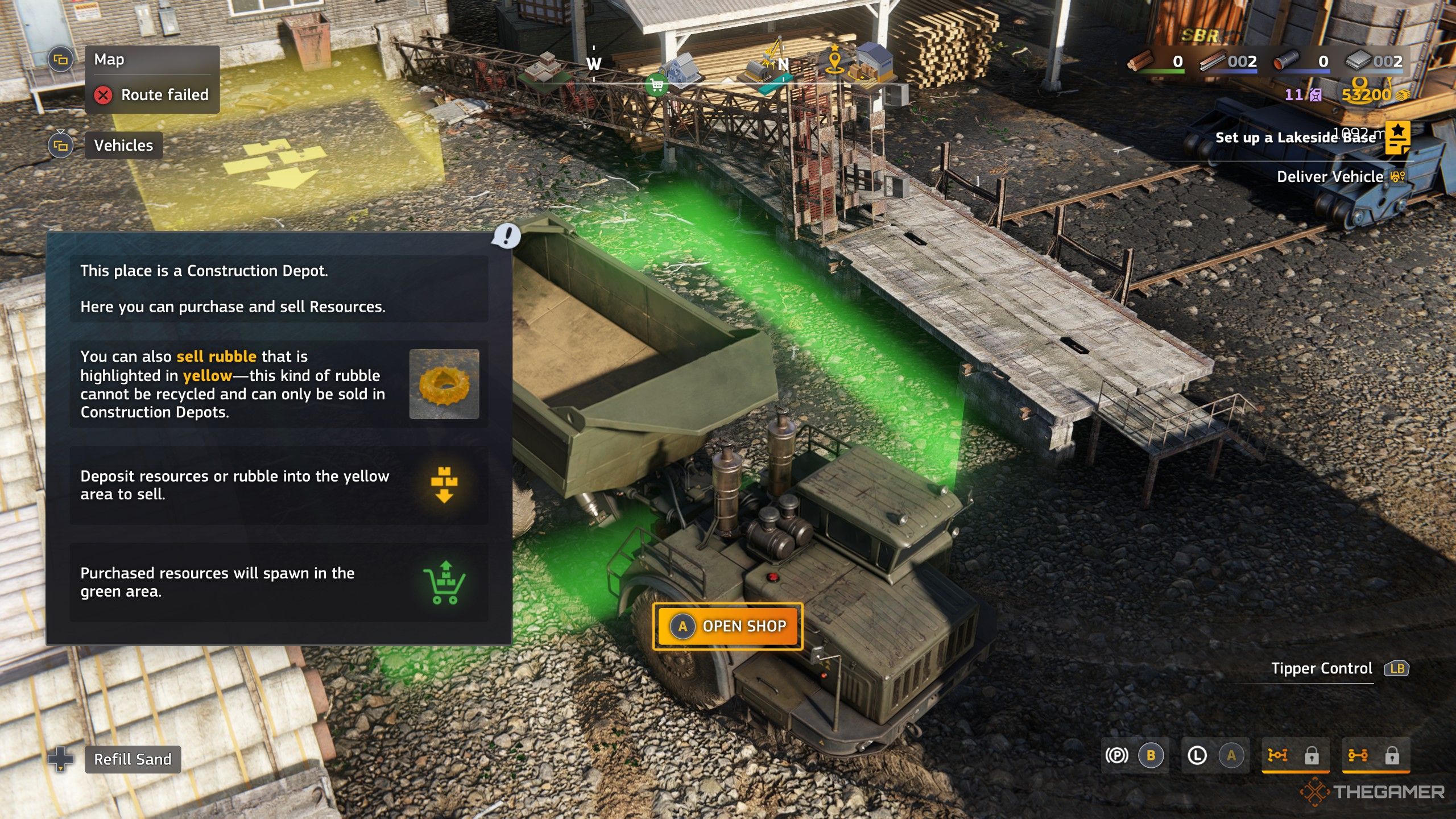 A dump truck sits at a construction depot in RoadCraft, with a pop-up prompt explaining the rules.