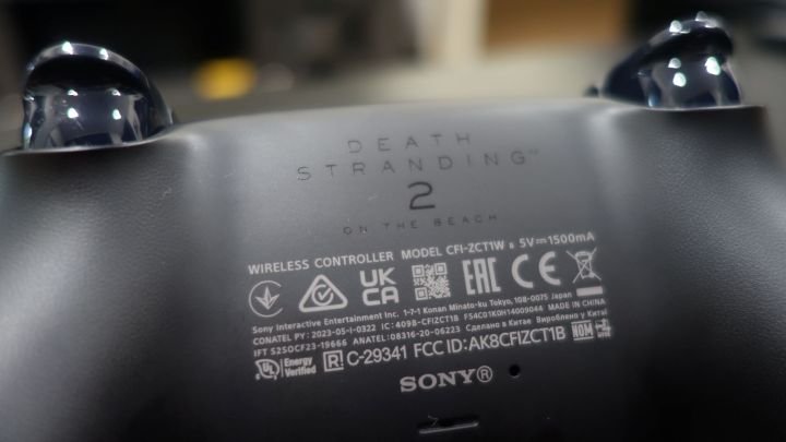 Death Stranding 2 logo appears on the back of a DualSense.