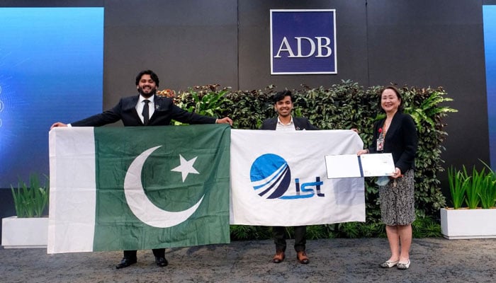 Ahmed Iqbal (left) and Abdullah Asif celebrating their success after winning the Best AI Use Case award at the APAC Solution Challenge in Manila, Philippines on June 26, 2025.