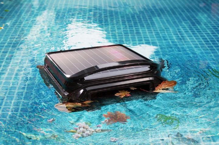 The Wybot F1 robotic pool cleaner in the water.