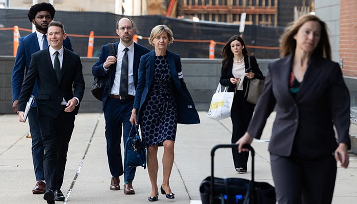 Susan Desmond-Hellmann, former Meta board member, arrives at the Leonard L. Williams Justice Center to testify in a trial regarding investor allegations against Zuckerberg and other Meta officials.