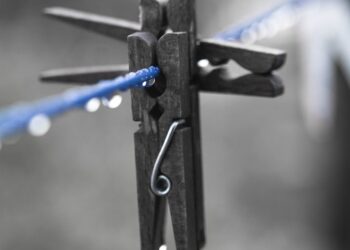 Digital warning alert while man types on a keyboard