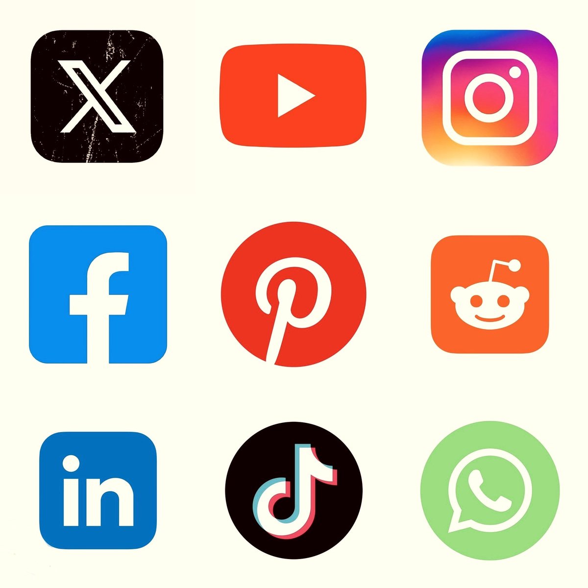 Image of a hand holding a smartphone with various app icons on the screen