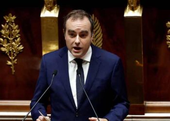 French PM escapes no-confidence votes following pension concession