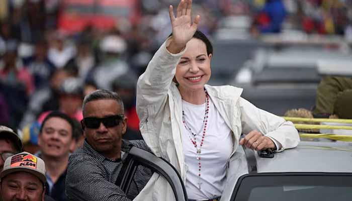 Venezuelan opposition leader Maria Corina Machado greets supporters during a campaign rally for the presidential election, in Merida state, Venezuela, June 25, 2024. — Reuters