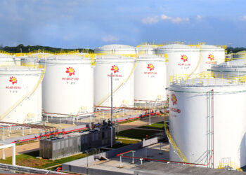 Heshun Gains for Third Day as Gas Station Titan Acquires Chip Company