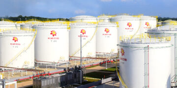 Heshun Gains for Third Day as Gas Station Titan Acquires Chip Company