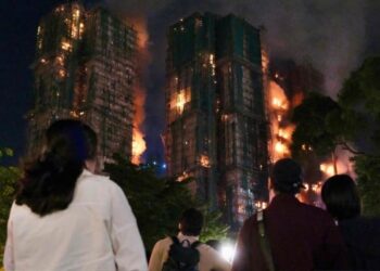 Major Fire Sweeps Hong Kong Homes, 13 Lives Lost