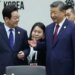 Xi's witty remark on 'backdoor' as he gifts Lee Xiaomi phones in China