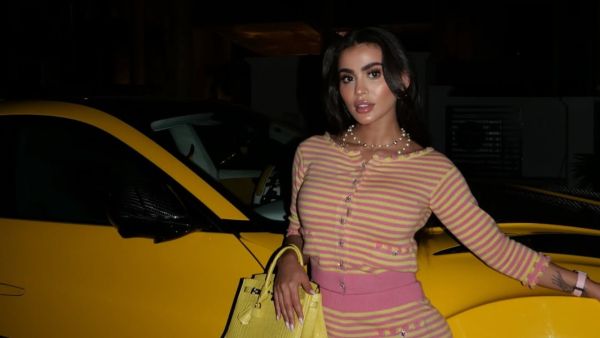 Youmna Khoury Dazzles at APM Monaco Dubai Gala with Rare Gifted Bag