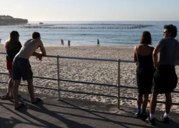 Australia to launch gun buyback after Bondi tragedy, surfers pay tribute