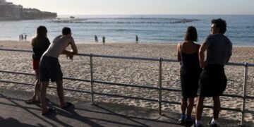 Australia to launch gun buyback after Bondi tragedy, surfers pay tribute