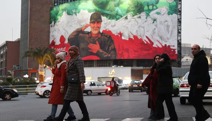 People walk on a street amid protests over currency devaluation in Tehran, Iran, January 2, 2026. — Reuters