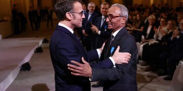 Paris's Last Newspaper Hawker Honored by Macron