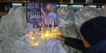 Trump brands Minneapolis nurse shot by agents as 'agitator'