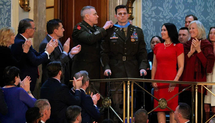 Chief Warrant Officer Eric Slover receives the Medal of Honor during Trump's State of the Union at the U.S. Capitol on February 25, 2026. — AFP