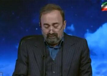 Iranian news anchor tears up during announcement of Supreme Leader's death