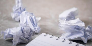 Chrome app icon on laptop screen with other app icons around it