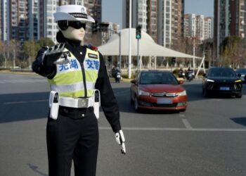 China's Robot Police Patrol Cities During Labor Day Holiday