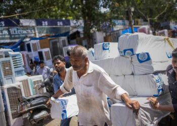India faces power shortages as heatwave spikes electricity demand to record