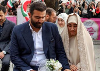 Iran hosts mass weddings for couples prepared for sacrifice